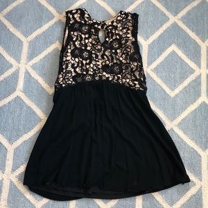 Black dress with a lace top.